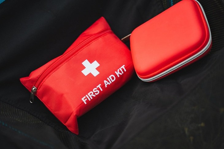 A first aid kid on the ground