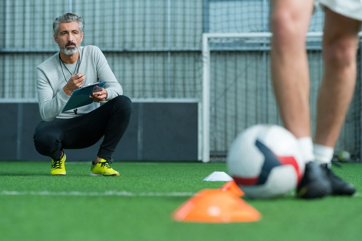 Football coach during training session