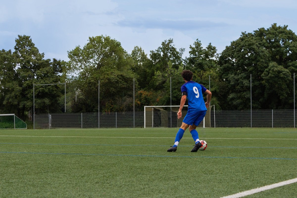 Striker with number 9 on shirt