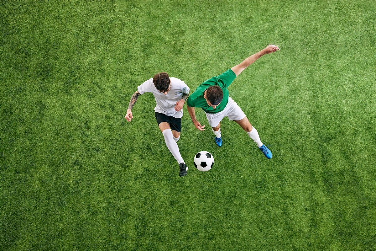 Youths playing football